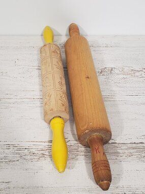 2 wooden rolling pins - 1 with cut out designs 16" long & 17.5" long